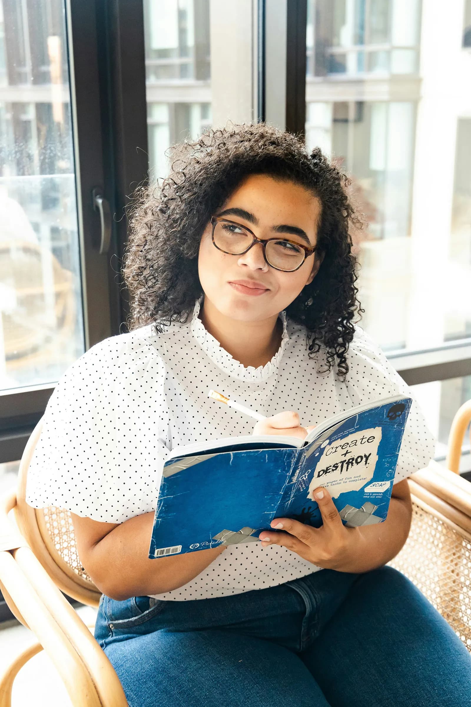 The girl is reading a book